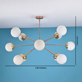 Brass Sputnik chandelier with 12 frosted globe shades, measuring 44 inches wide and 26 inches high, displayed against a blue wall.
