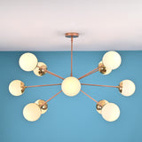 12 opal glass sputnik chandelier in solid brass with mid century modern radial design, warm ambient ceiling lighting