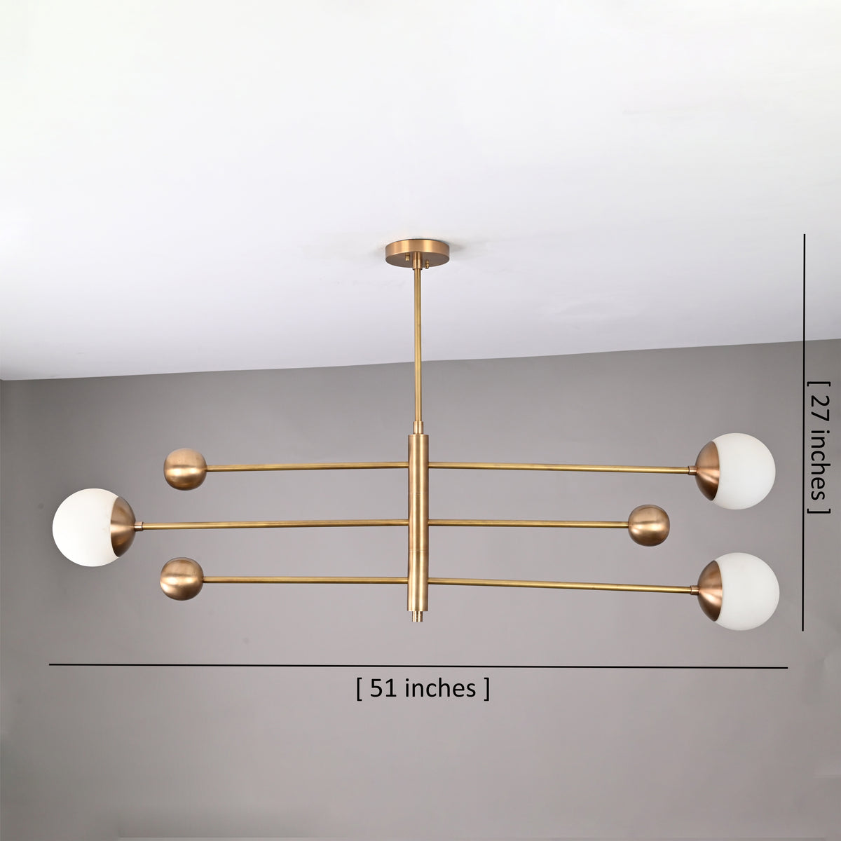 Modern 3-globe brass chandelier with opal globes, 51-inch wide handcrafted brass light by Brass Leaf Studio.