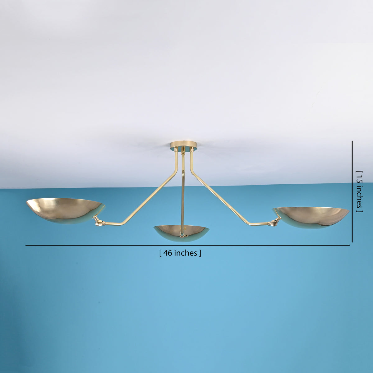 3 light bowl shaped brass flushmount ceiling light showing 46 inch width and 15 inch height with minimalist disc design