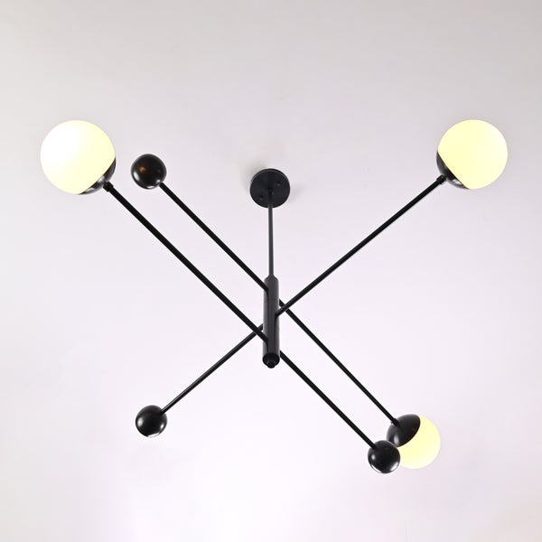 Minimalist matte black 3-light chandelier with balanced linear arms – upward view