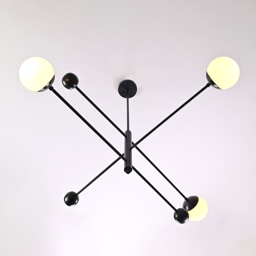 Minimalist matte black 3-light chandelier with balanced linear arms – upward view