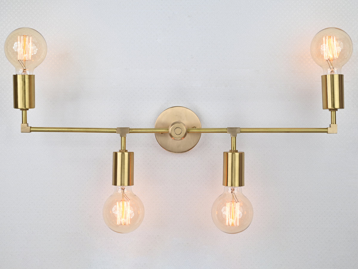 Berlin Axis 4-light brass wall sconce by Brass Leaf Studio