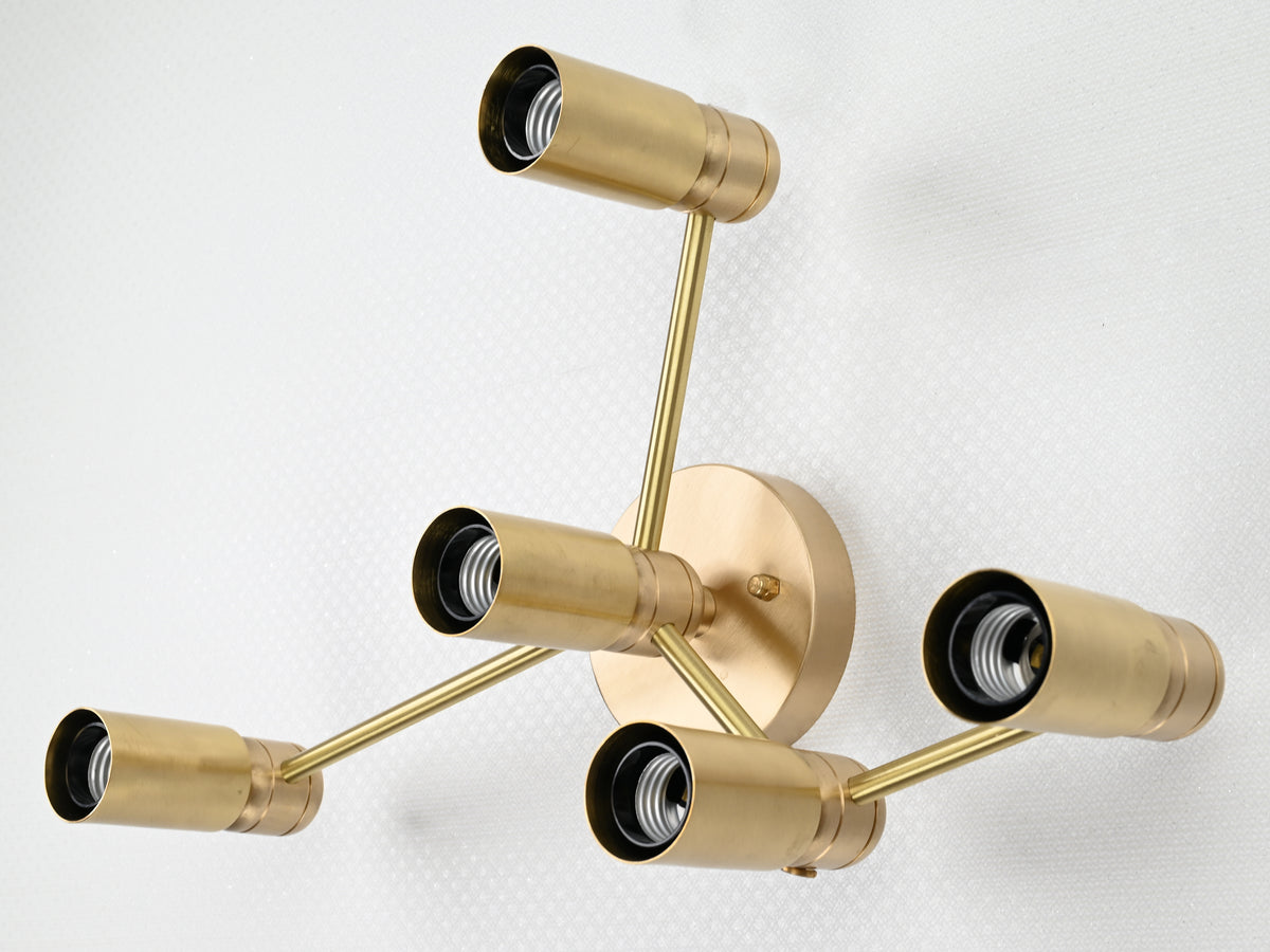 Modern geometric five-light wall sconce in brass