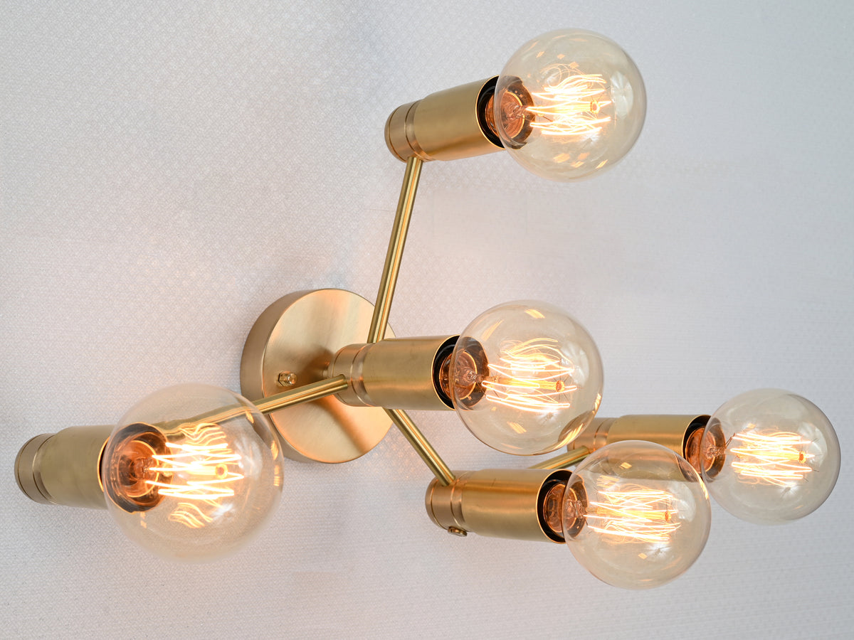 Berlin Axis 5-light brass wall sconce by Brass Leaf Studio