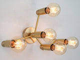 Berlin Axis 5-light brass wall sconce by Brass Leaf Studio