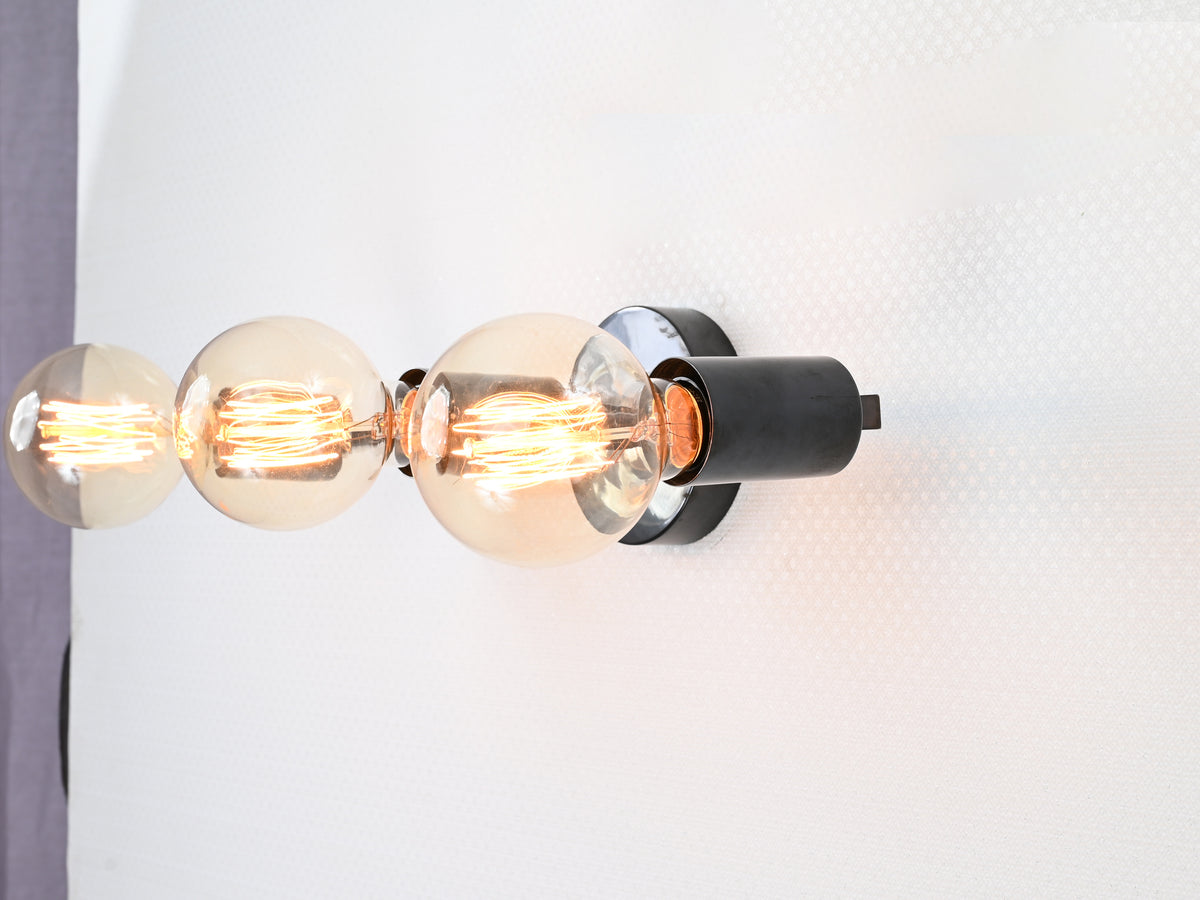 Architectural linear brass wall sconce design detail
