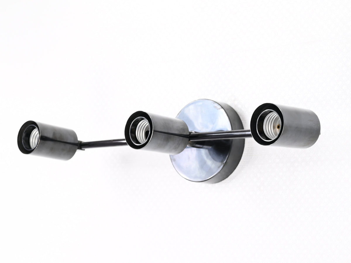 Berlin Axis exposed-bulb brass wall light detail
