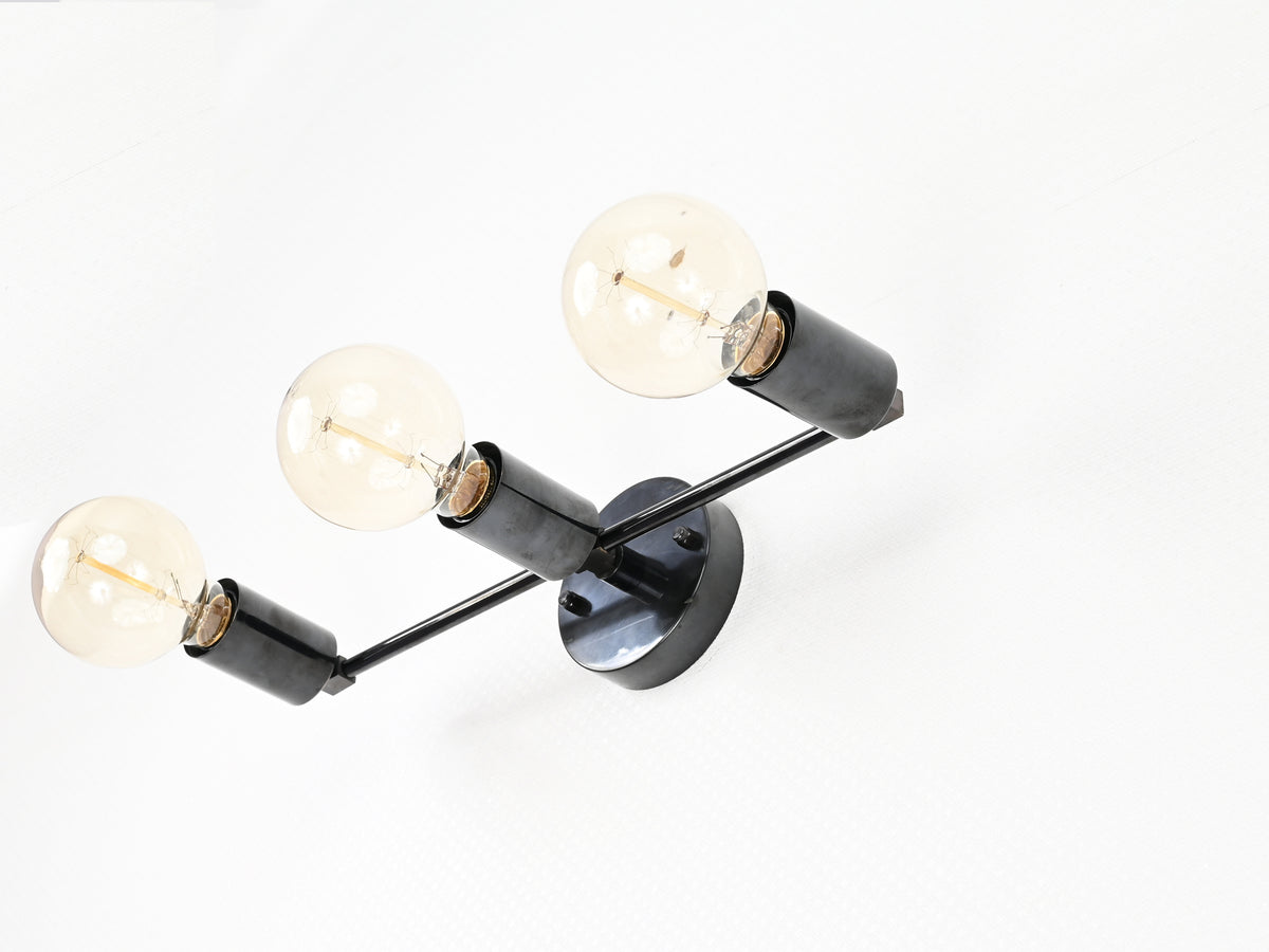 Berlin Axis mid-century brass wall sconce front view