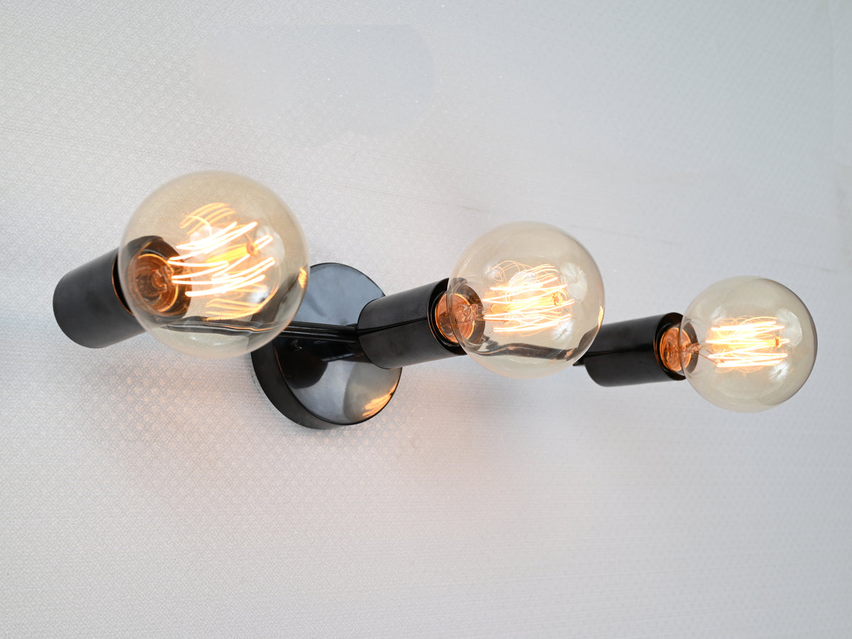 Berlin Axis 3-light brass wall sconce by Brass Leaf Studio