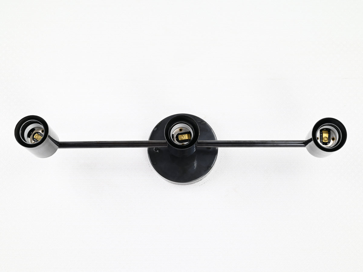 Custom finish three-light brass wall sconce
