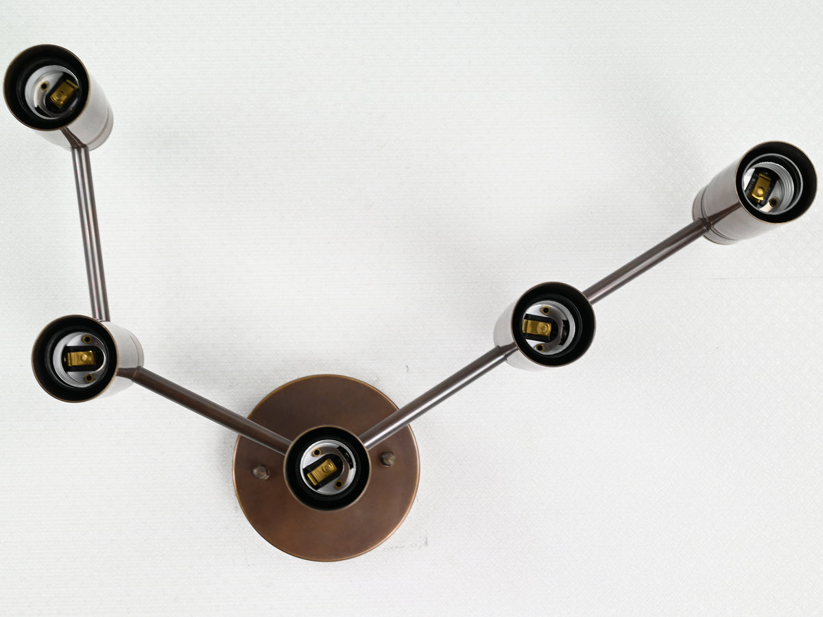 Modern linear brass wall light with E26 bulb holders