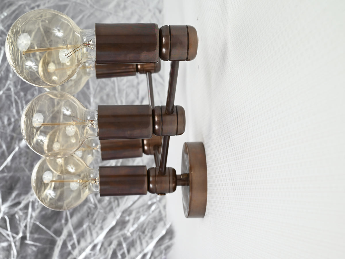 Custom finish five-light brass wall sconce