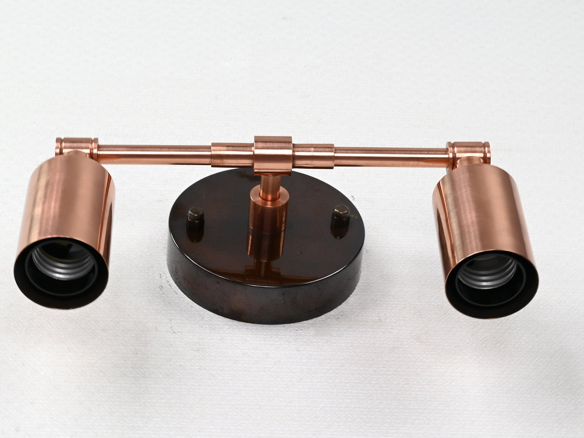 Small wall-mounted brass light with E26 bulb holders