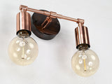 Modern compact brass wall sconce with balanced two-light design