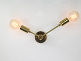 Contemporary Brass Twin Cone Wall Sconce | Customizable Angled Light Fixture for Elegant Interiors - 32533