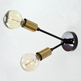 Modern Industrial Customizable Wall Sconce | Dual Brass Arms with Exposed Bulb Accent Lighting - 32550