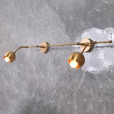 Modern Globe Arm Wall Sconce with Extended Bar Design | Customizable Dual Head Decorative Fixture - 32605