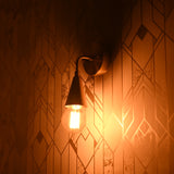 Mid-century modern Sputnik chandelier with 8 lights, brass frame, and teal cone shades