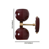 Side view of Brass Leaf Studio double globe wall sconce in burgundy with brushed brass base, showing precise dimensions.