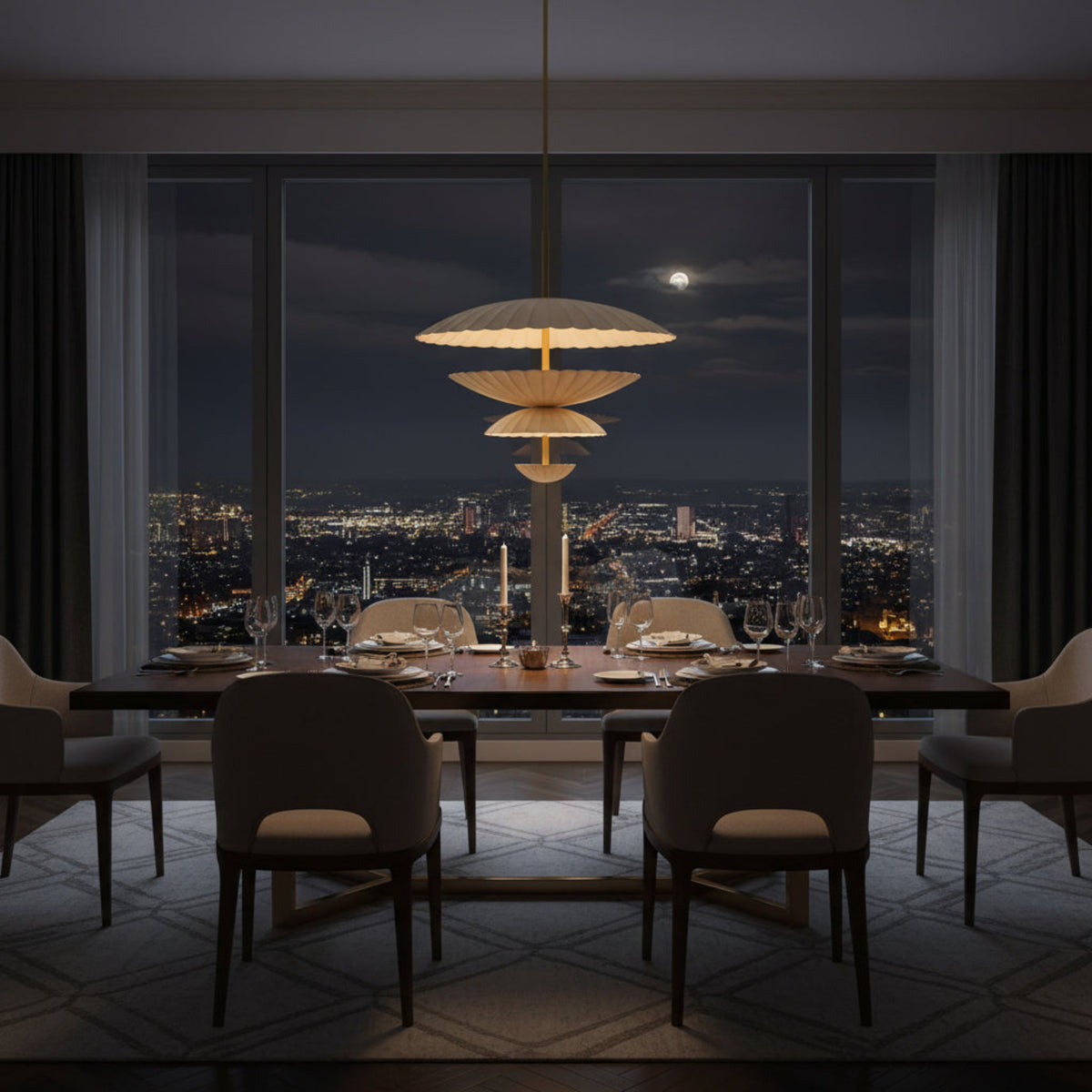 A modern multi-tier pendant light fixture with fluted, scalloped shades in warm cream and beige tones, accented by gold-toned metal rods and inner linings, shown against a solid white background.