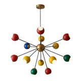 A mid-century modern multi-arm chandelier with a brass-finished central hub and canopy, featuring colorful spherical shades in red, yellow, green, and blue on black metal arms, shown against a plain white background.