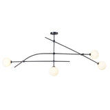 Angled view of 4-globe modern brass chandelier showcasing sleek brass arms and opal glass shades