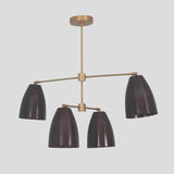 Close-up of handmade 4-light brass chandelier – solid brass frame with blackened cone shades and lacquer finish