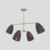 Side angle of 4-light brass chandelier – handcrafted pendant with bold cone shades and industrial modern aesthetic