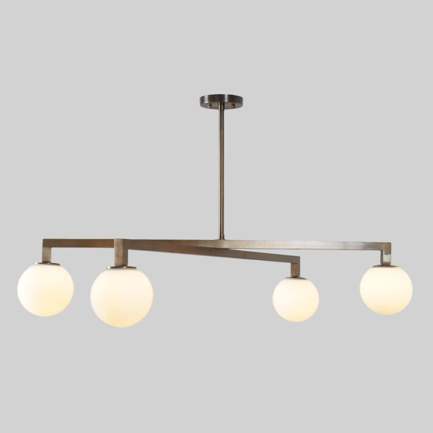 4-Light Brass Linear Globe Chandelier | Modern Minimalist Ceiling Light by Brass Leaf Studio