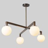 Modern 4-Light Brass Linear Chandelier with Frosted Globes | Handmade Ceiling Light Fixture by Brass Leaf Studio