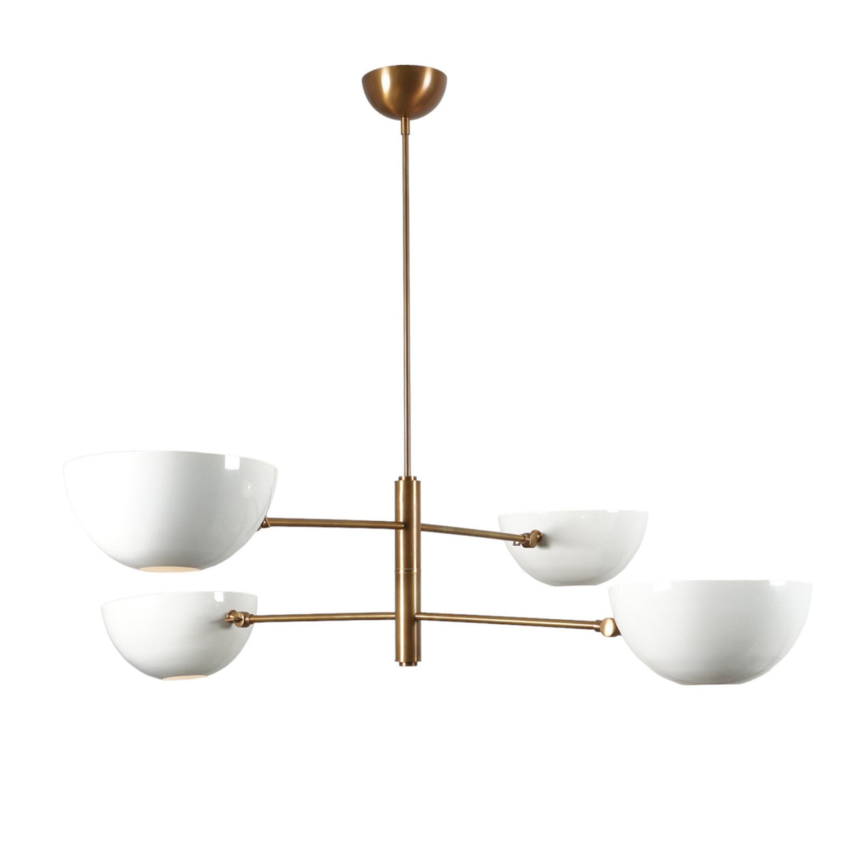 Side view of 4-light brass chandelier featuring minimalist white dome shades for soft illumination