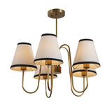 5 Light Brass Chandelier with white fabric shades and black trim, handcrafted by Brass Leaf Studio for elegant modern interiors