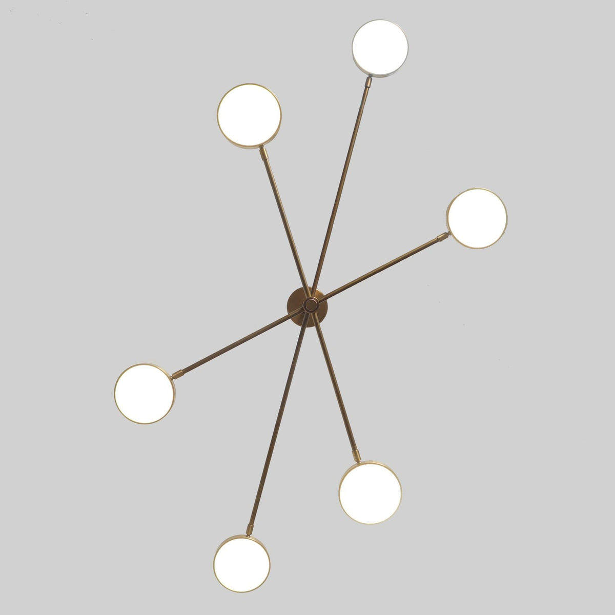 Top view of 6 Disc Arm Brass Chandelier displaying geometric arm arrangement and circular light diffusers – modern ceiling light by Brass Leaf Studio