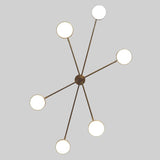 Top view of 6 Disc Arm Brass Chandelier displaying geometric arm arrangement and circular light diffusers – modern ceiling light by Brass Leaf Studio