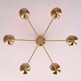 Top view of 6 light brass chandelier showing central canopy, balanced arm layout, and premium brushed brass construction.