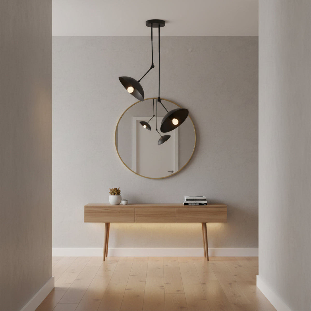 A modern black dual-light pendant ceiling fixture with two adjustable conical shades suspended from a round ceiling canopy on a plain white background.