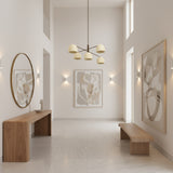 A modern 5-light chandelier with cream-colored dome-shaped shades and a dark brown metal frame, shown against a plain white background.