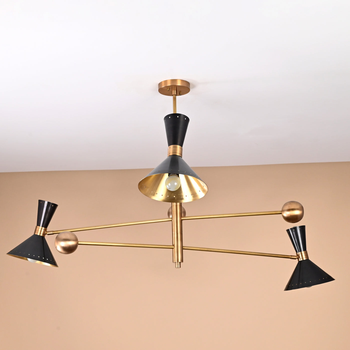 Mid-century modern 6 light brass chandelier with black cone shades and adjustable arms