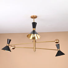 Mid-century modern 6 light brass chandelier with black cone shades and adjustable arms
