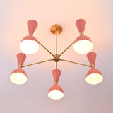 Bottom view of six-light peach brass chandelier with perforated shades emitting soft glow