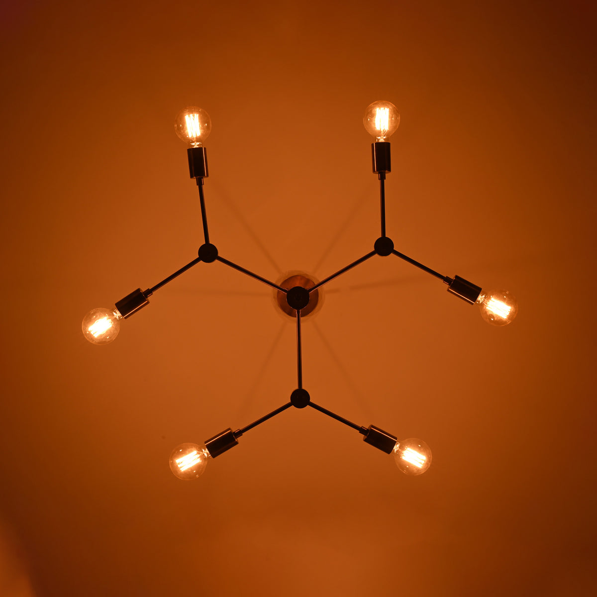 Modern 8-Light Brass Chandelier – Sculptural Ceiling Fixture with Industrial Globe Bulbs

 - 32214