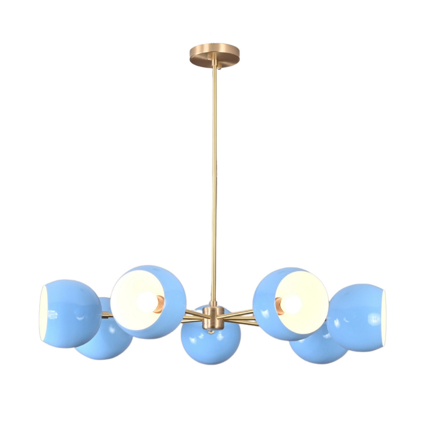 Front view of 7 bowl blue glass chandelier in solid brass providing warm ambient lighting
