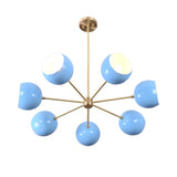 Handcrafted 7 bowl brass chandelier with blue glass shades on white background by Brass Leaf Studio