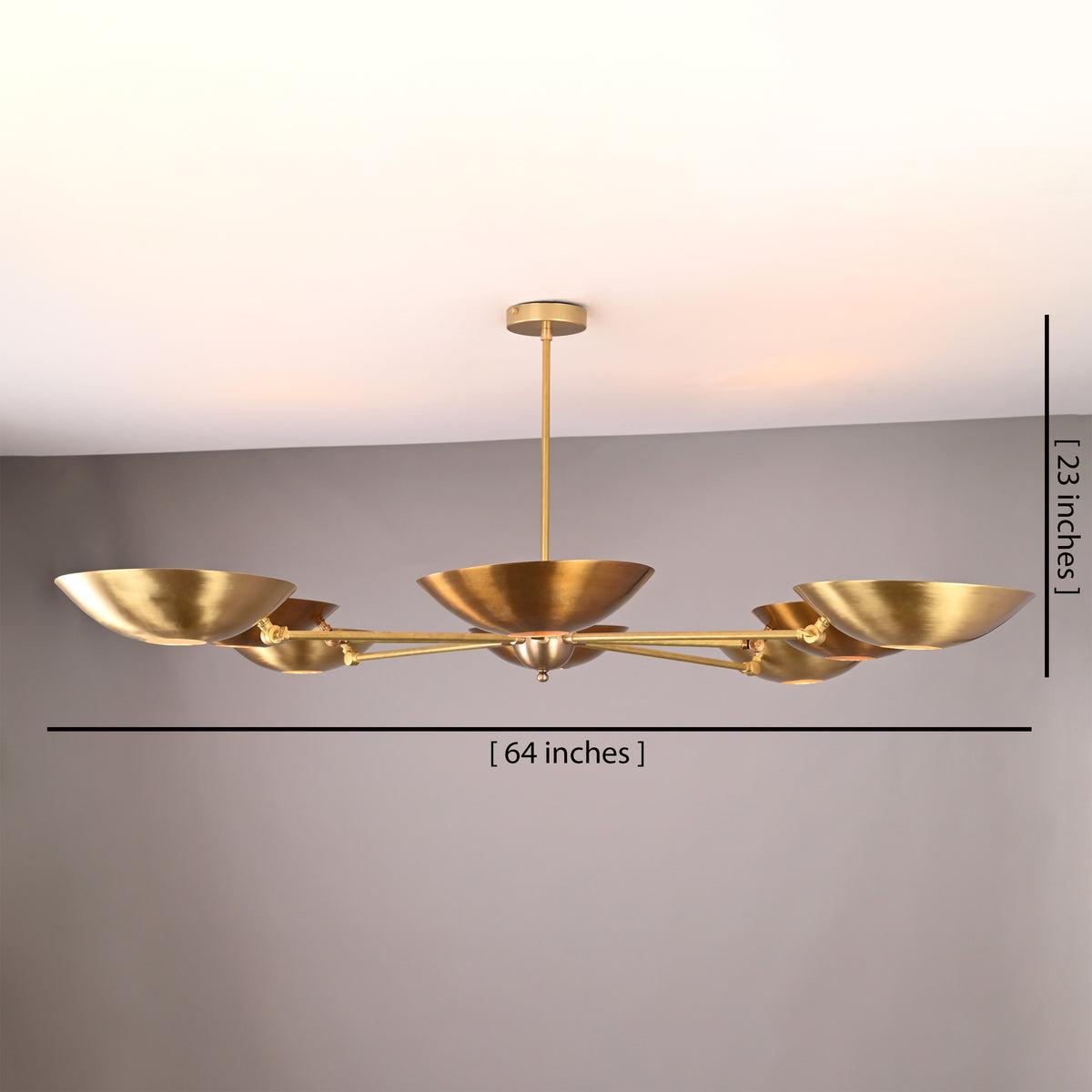 8-light mid-century brass disc chandelier with 64-inch width and 23-inch height shown in brushed brass finish.