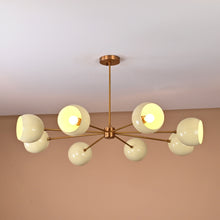 8-light modern brass chandelier with cream dome shades, handcrafted ceiling light by Brass Leaf Studio