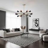 Alexandria 18 light black cone Sputnik chandelier shown from the front with brass-tone radial arms and contrasting white shade interiors.