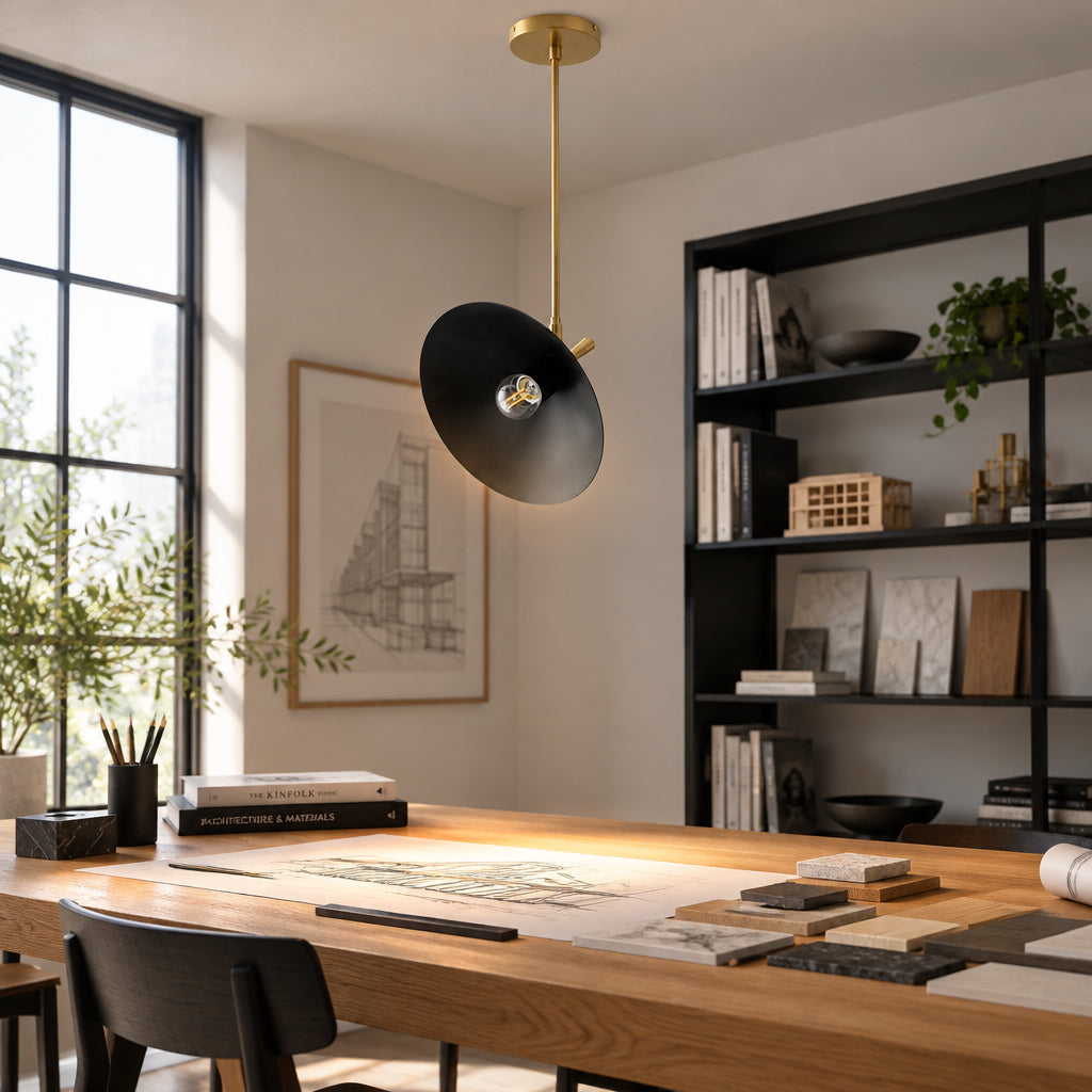 Antwerp 1 light black cone pendant shown from an angled lower view with brass-tone hardware and exposed globe bulb.