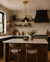 Antwerp 1 light black cone pendant with brass-tone accents displayed above a modern kitchen island with warm ambient lighting.