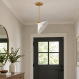 Antwerp 1 light cone pendant shown with white metal shade, brass-tone downrod and adjustable sculptural accent.